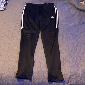 Black Adidas sweatpants;small